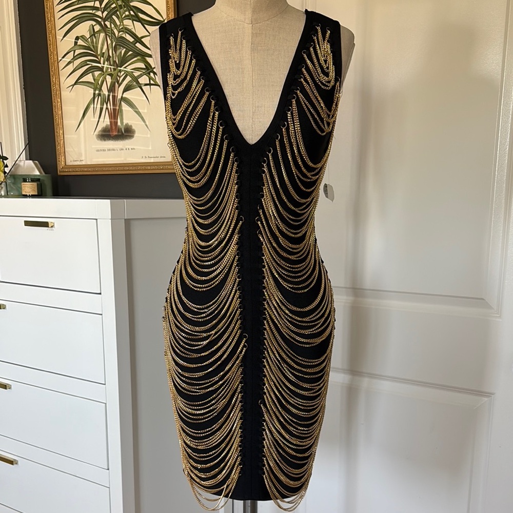 Chic Black Mini Dress with Gold Chain Accents